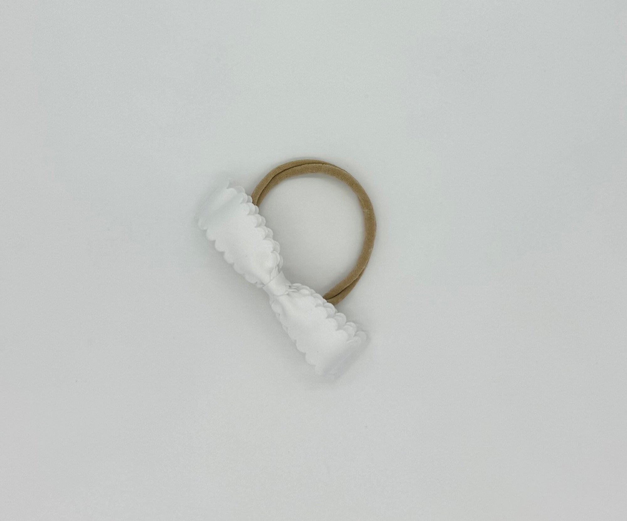Bandita curveada aplastada
