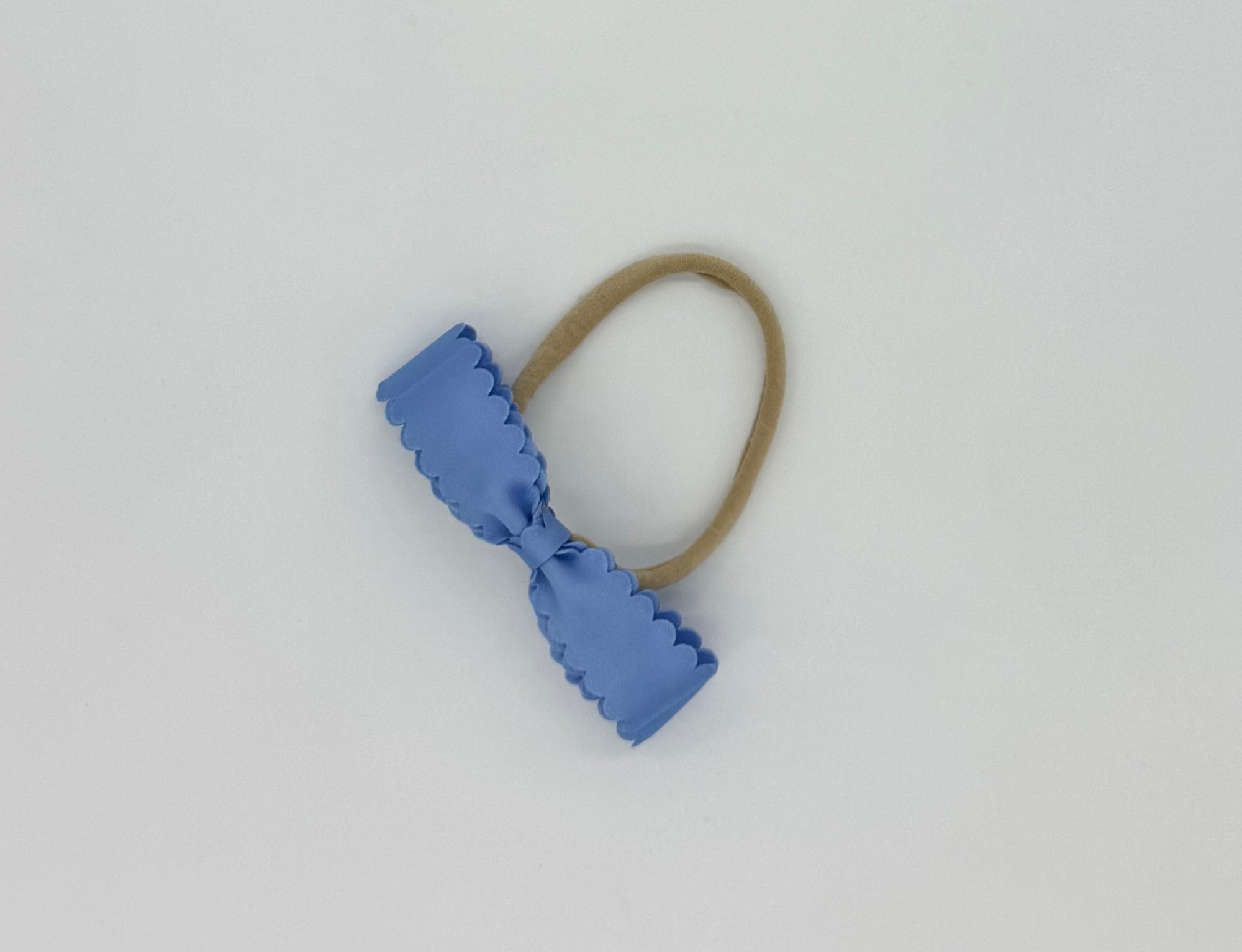 Bandita curveada aplastada